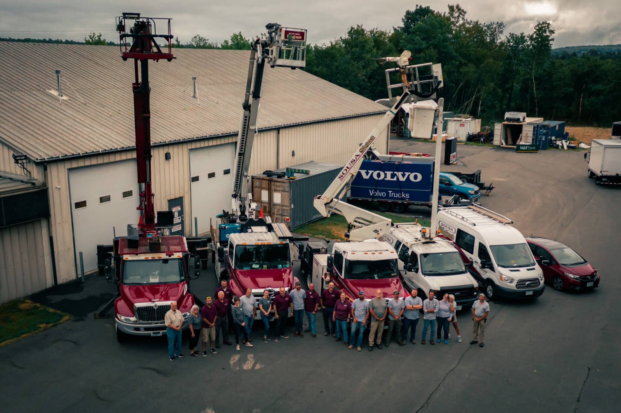 Commercial photography drone photo of bucket trucks and sousa signs team video production digital video advertising