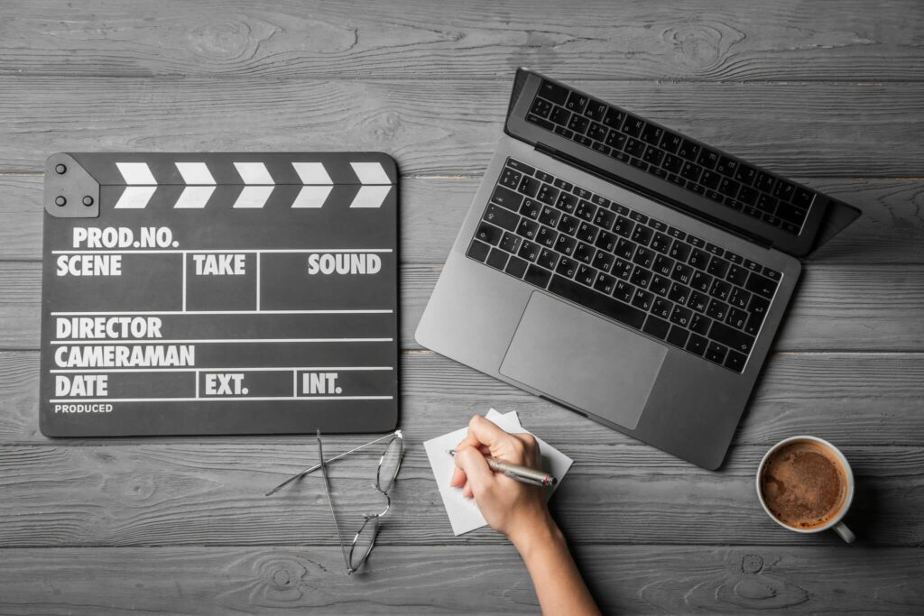 video production movie slate laptop