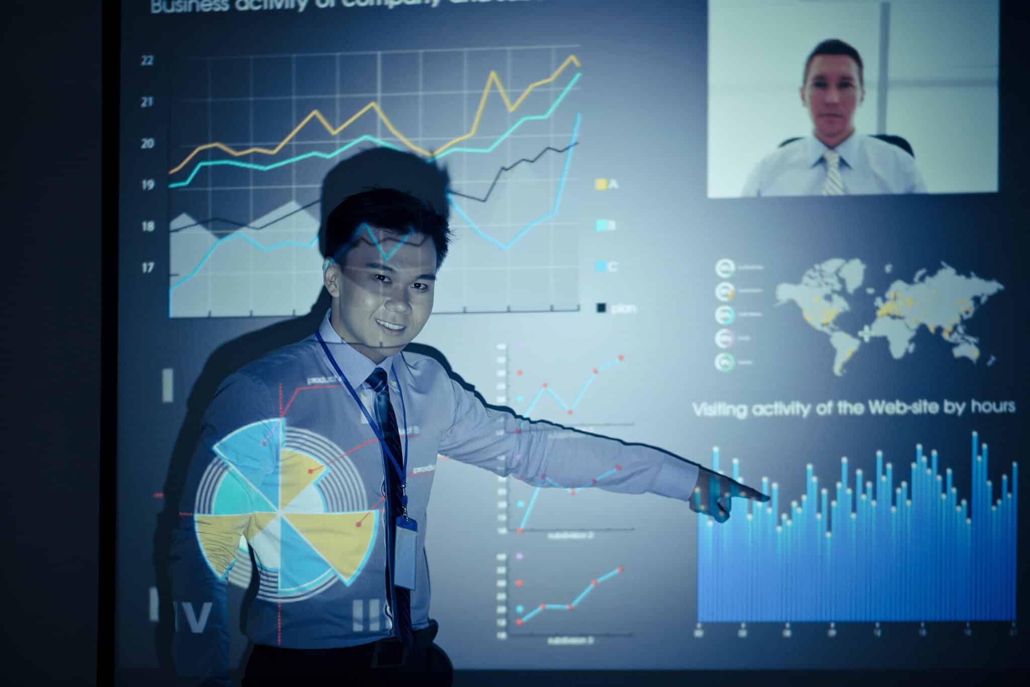 man pointing to graphs video production marketing advertising cinematic marketing