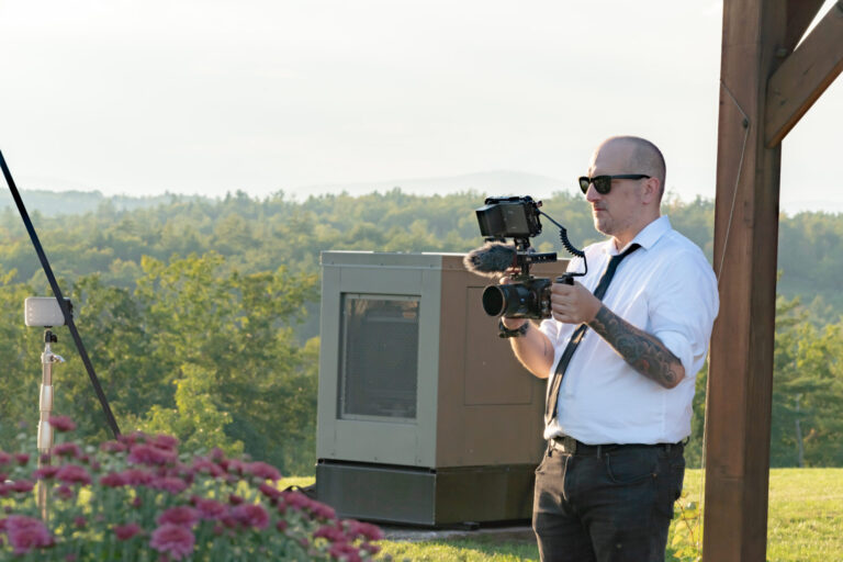 lifi media video production companies near me, videographer films an outdoor dining experience