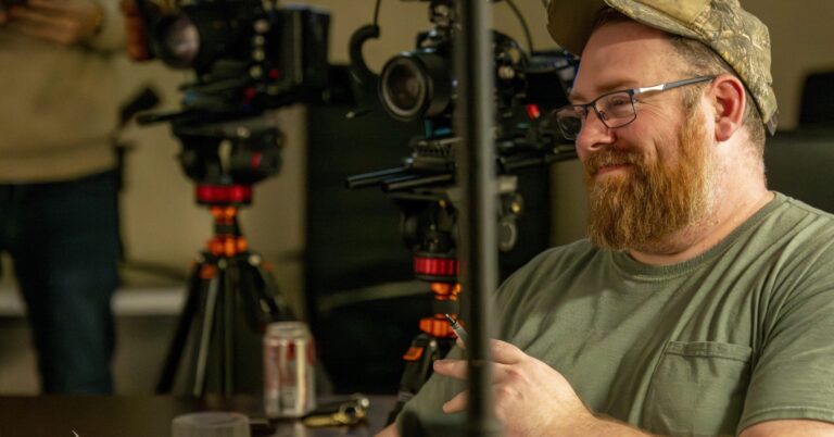 full service video production local video production services nh lifi media production, videographer holds camera to conduct interview