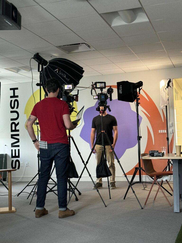 LiFi Media films for Semrush in Boston, Massachusetts. Videographer adjusts camera for interviews.