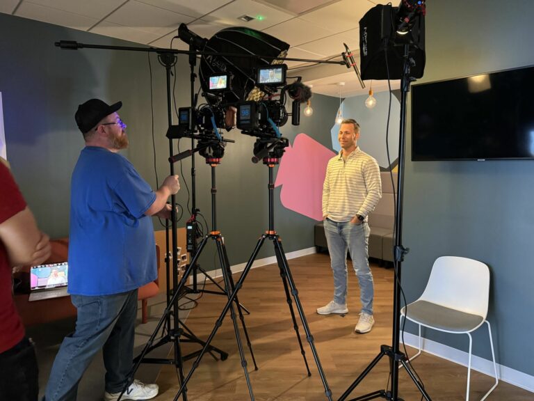 LiFi Media films for Semrush in Boston, Massachusetts. Videographer adjusts camera for interviews.