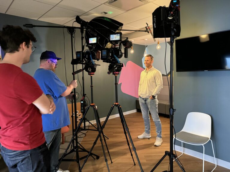 LiFi Media films for Semrush in Boston, Massachusetts. Videographer adjusts camera for interviews.