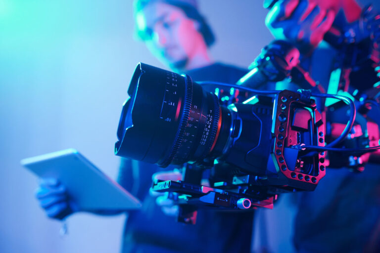 heartbeep marketing nh video production manchester nh, Close-up of operator using professional camera during shooting with director controlling the process