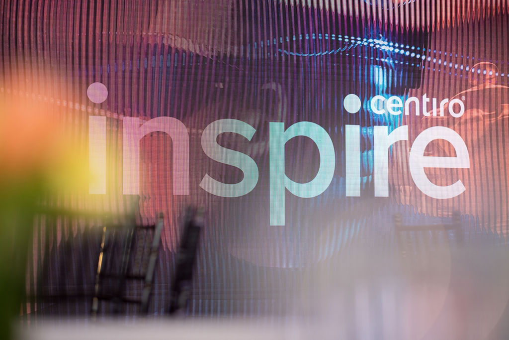 Centiro Inspire corporate event stage and branded display