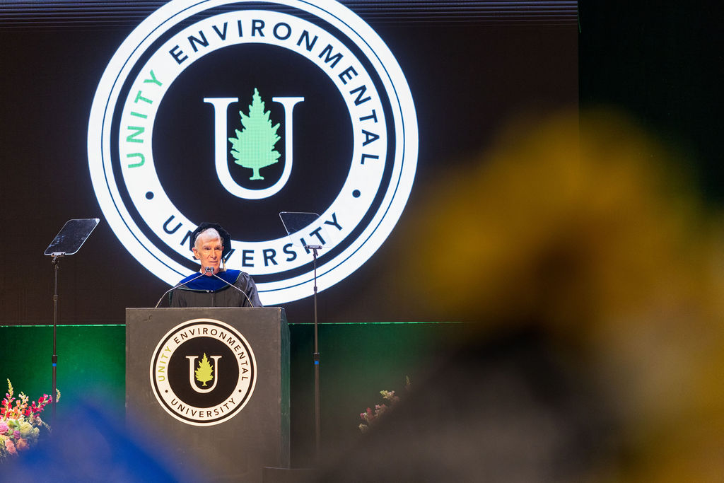 Unity Environmental University commencement speaker on stage