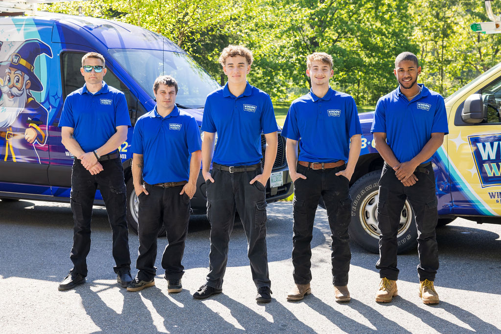 Window Wizards service team with branded company vehicles